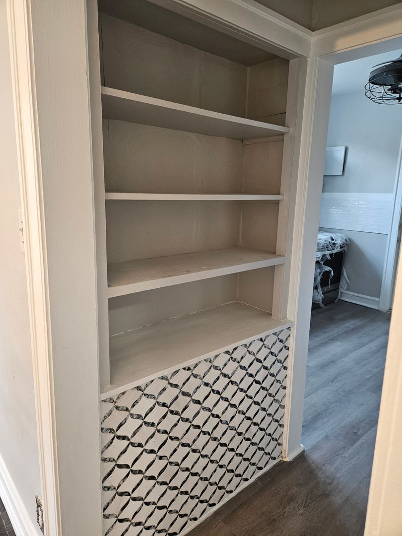 8309 South Throop Street, Unit 3 Chicago, IL 60620 - Photo 13 of 15 a room with wooden floor