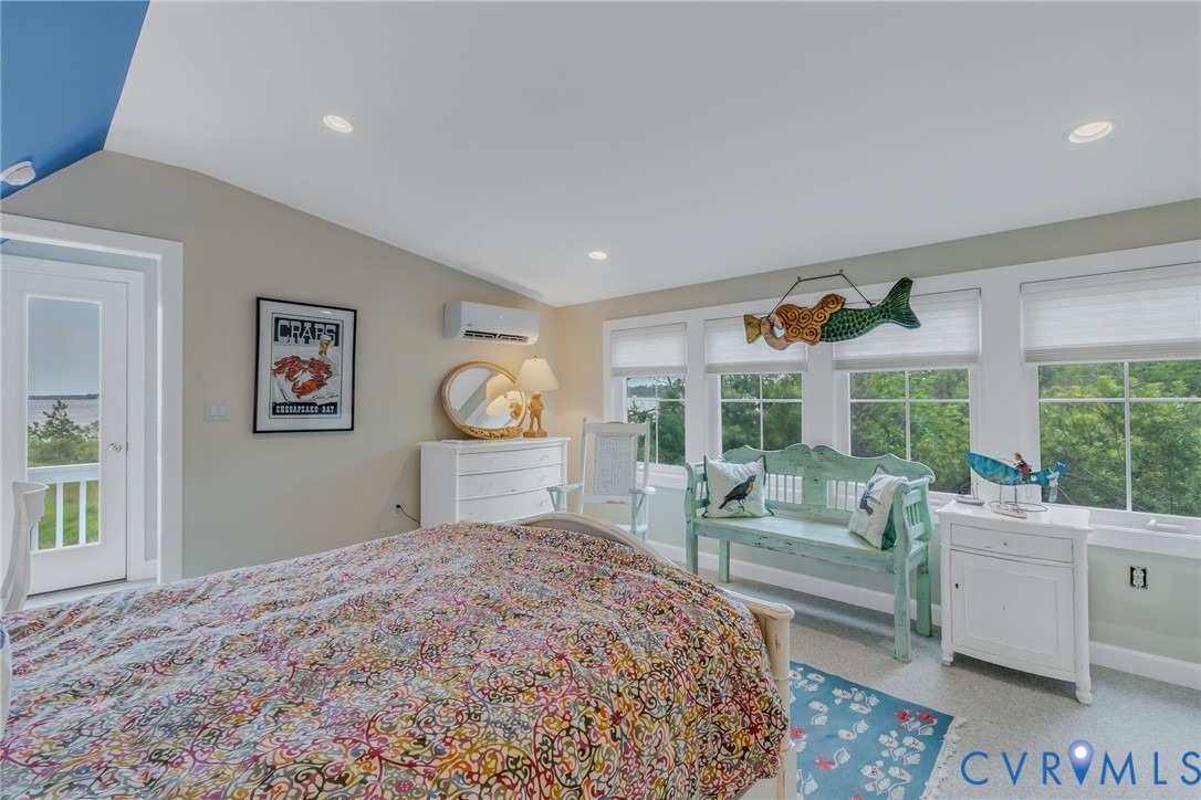 1071 Gum Thicket Road Gwynn, VA 23076 - Photo 38 of 53 a bedroom with a bed and a large window