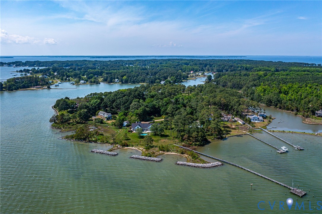 1071 Gum Thicket Road Gwynn, VA 23076 - Photo 40 of 53 an aerial view of a house with a yard and lake view