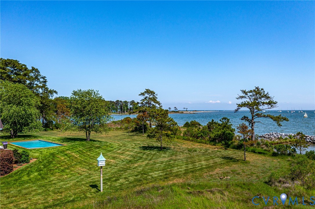 1071 Gum Thicket Road Gwynn, VA 23076 - Photo 48 of 53 a view of a golf course with a lake