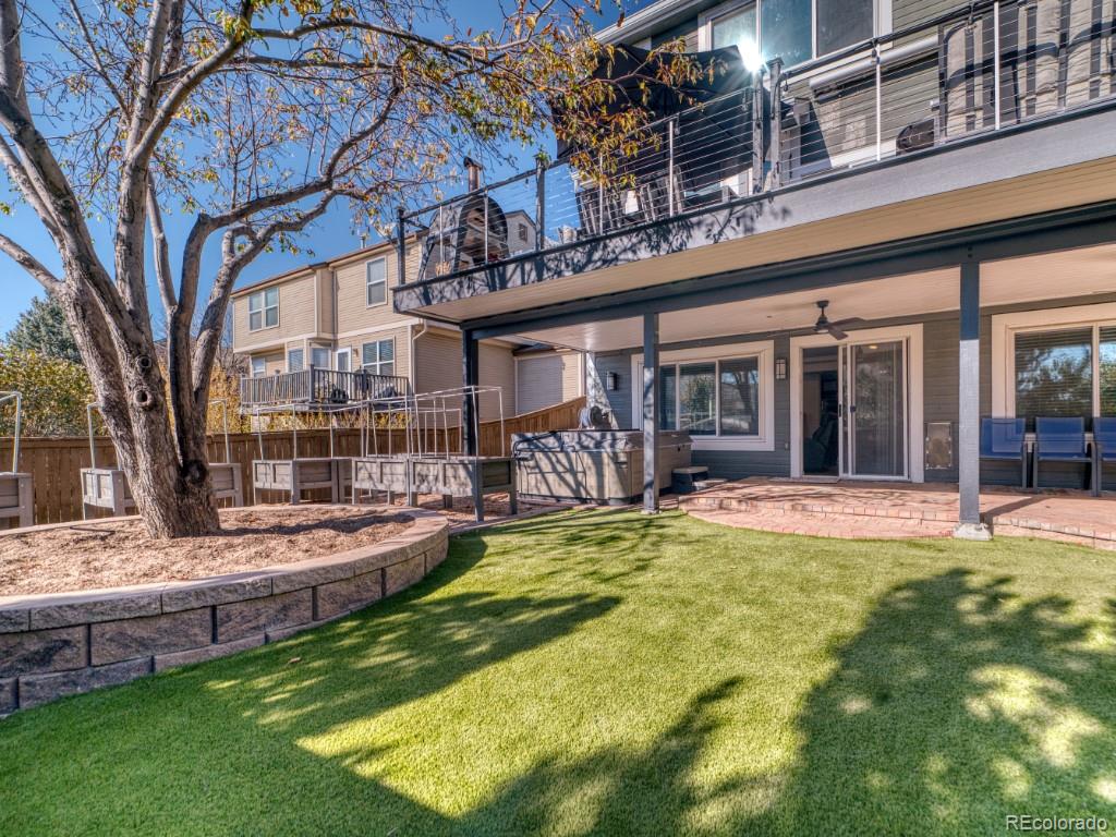 1864 Mountain Maple Avenue Highlands Ranch, CO 80129 - Photo 22 of 35 a view of a house with swimming pool and sitting area
