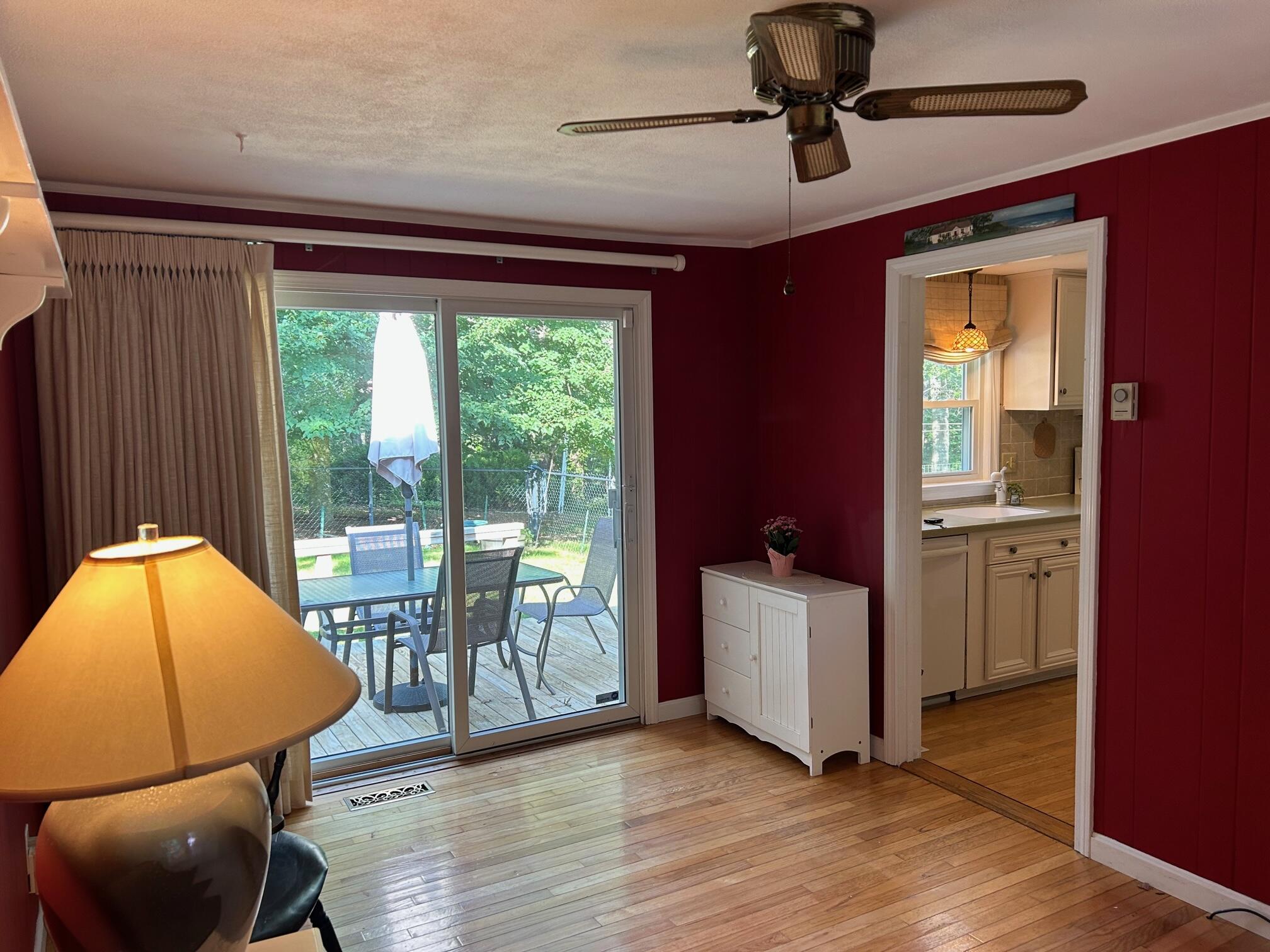 5 Acorn Road Dennis, MA 02638 - Photo 9 of 27 a view of a livingroom with furniture and a floor to ceiling window