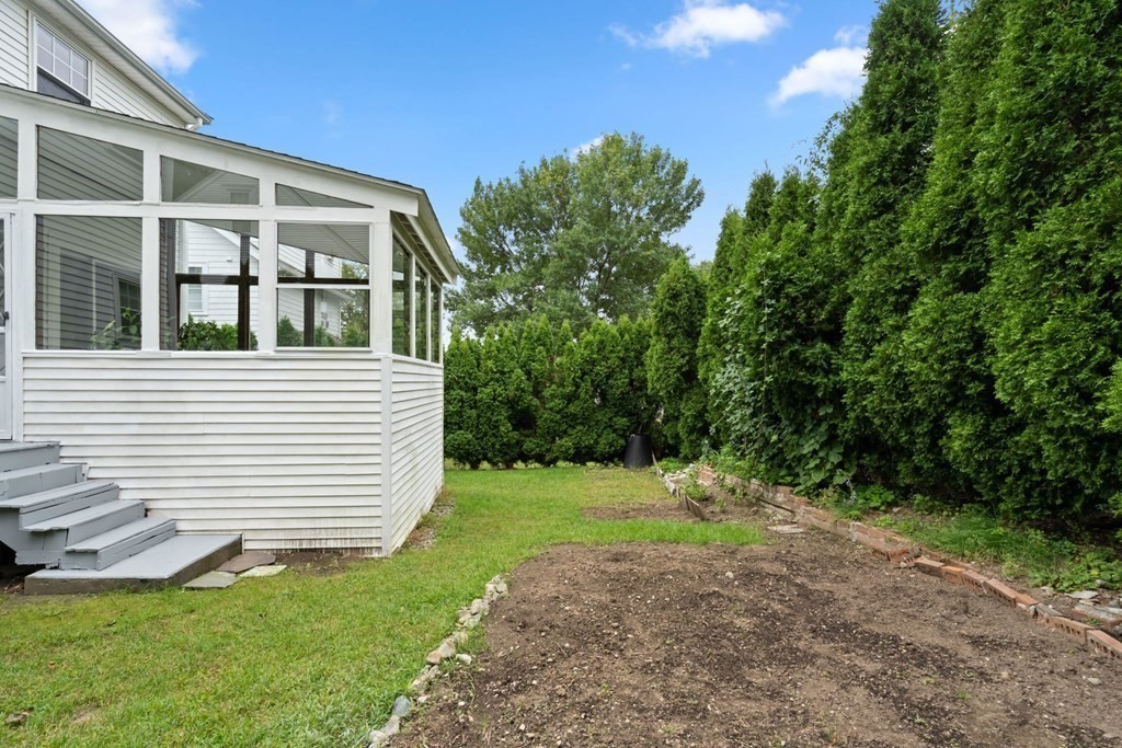 12 Lansdowne Road Arlington, MA 02474 - Photo 25 of 26 a view of a house with a yard