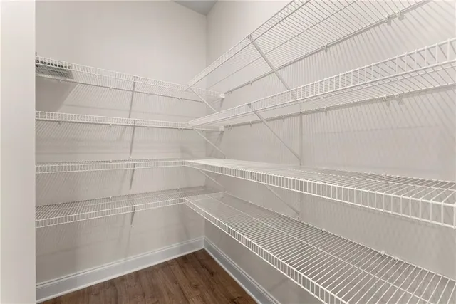 a view of a room with racks on the wall