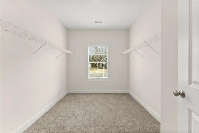 a view of a room that has a window in it