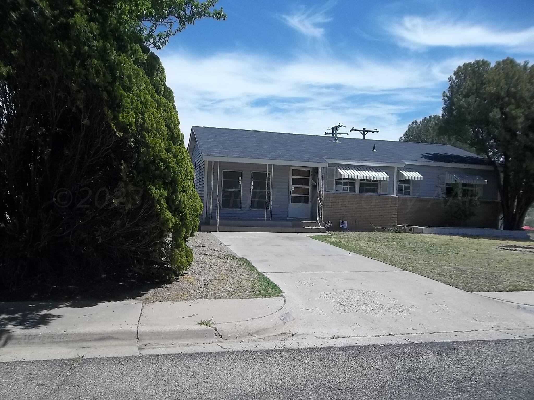 2500 Chestnut Street Amarillo, TX 79107 - Photo 2 of 20 front view of a house with a yard