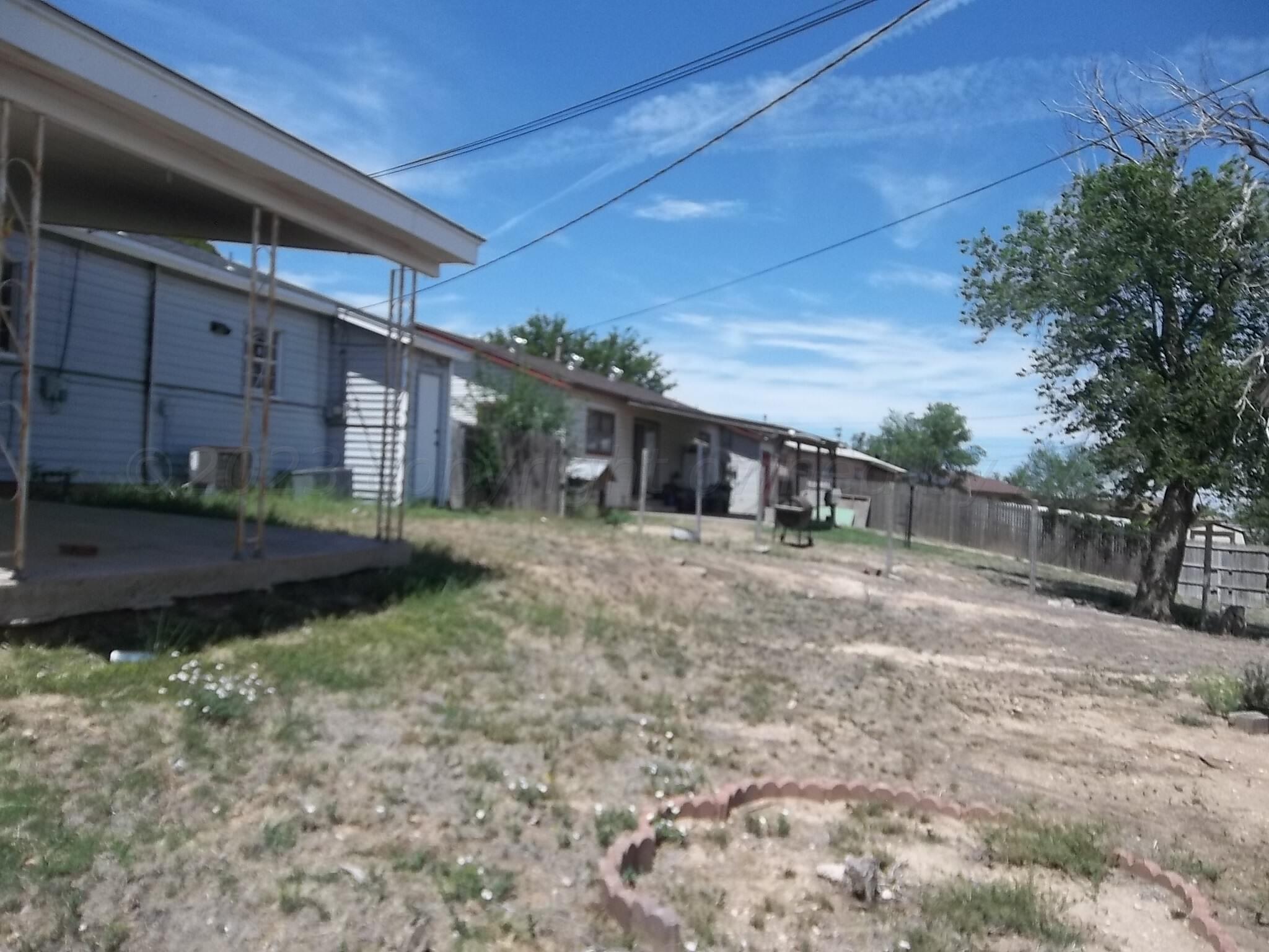 2500 Chestnut Street Amarillo, TX 79107 - Photo 5 of 20 a front view of a house with garden