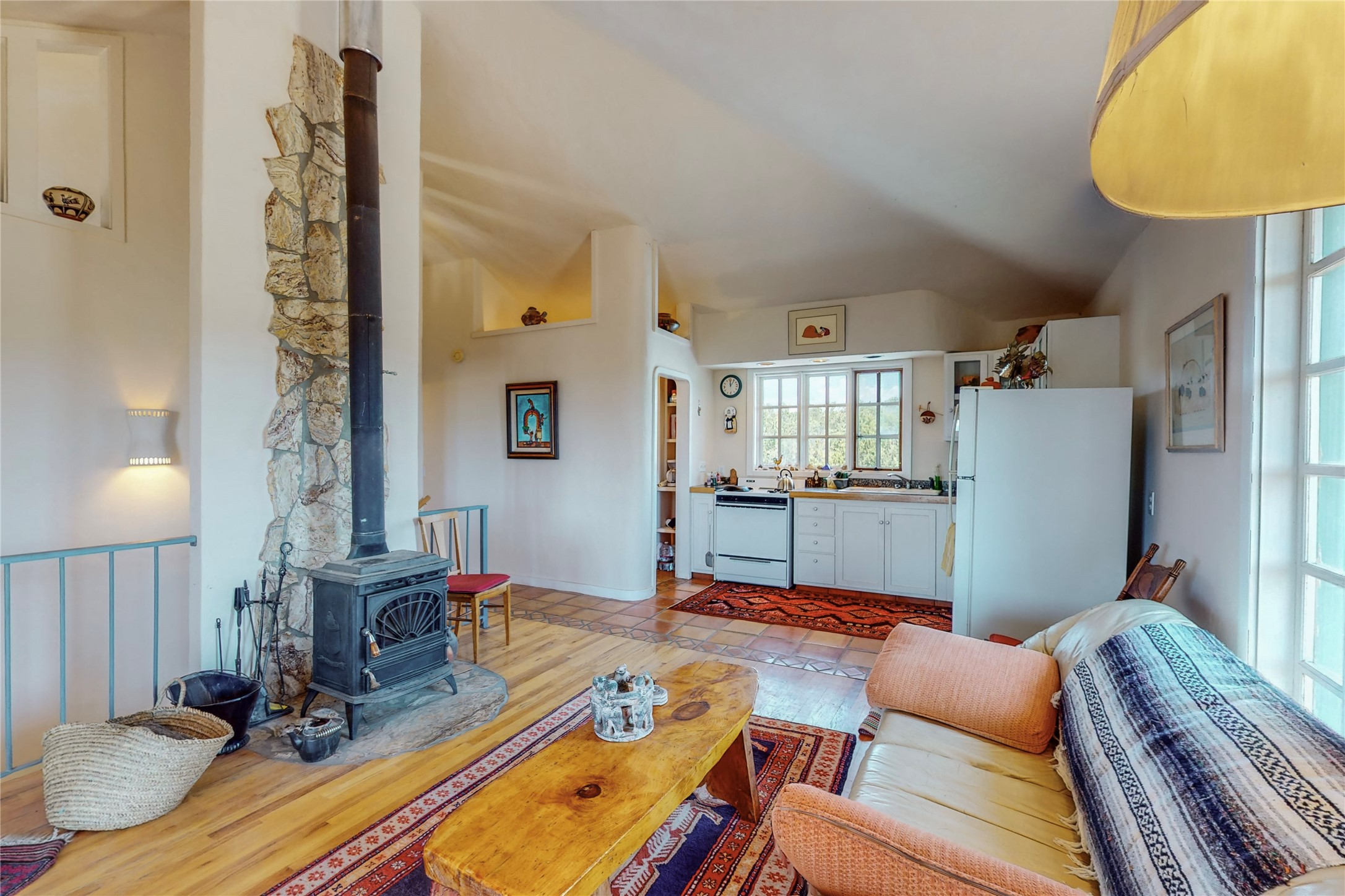 175 Hidden Valley Ranch Road Ilfeld, NM 87538 - Photo 5 of 43 Livingroom, wood stove, kitchen