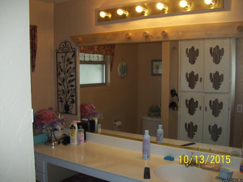 7185 Chocco Road Big River, CA 92242 - Photo 6 of 13 a bathroom with a sink and a mirror