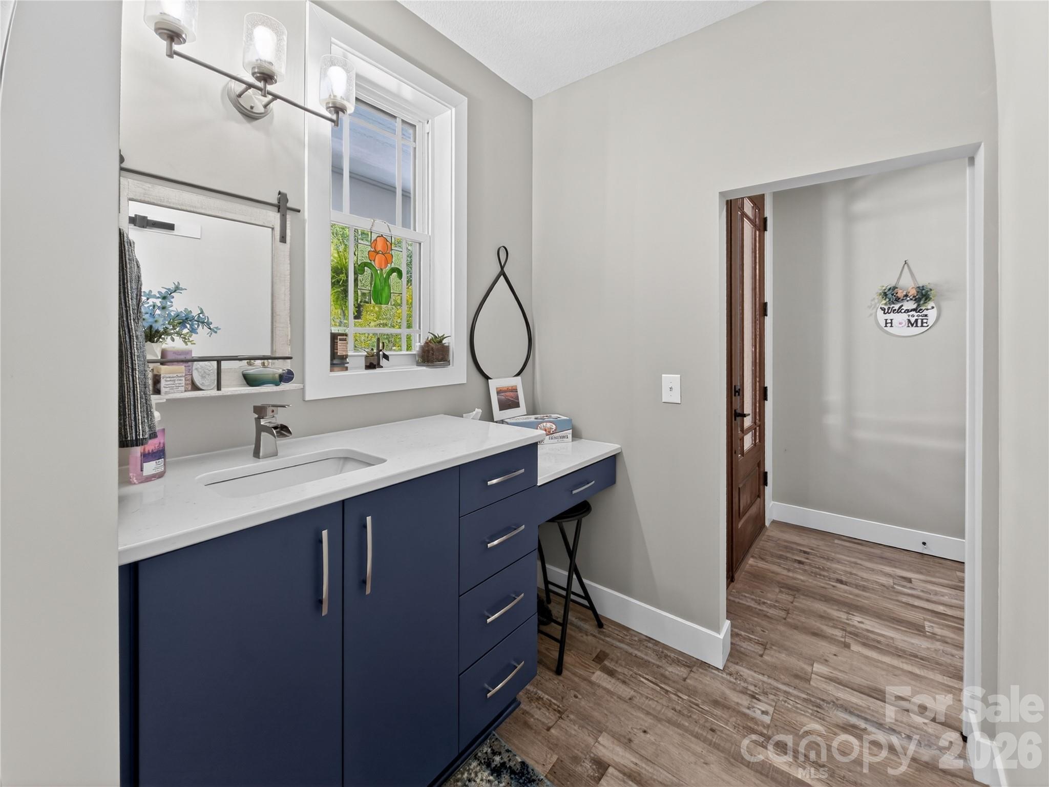 278 Hunters Trace Rutherfordton, NC 28139 - Photo 14 of 33 a bathroom with a sink and a mirror
