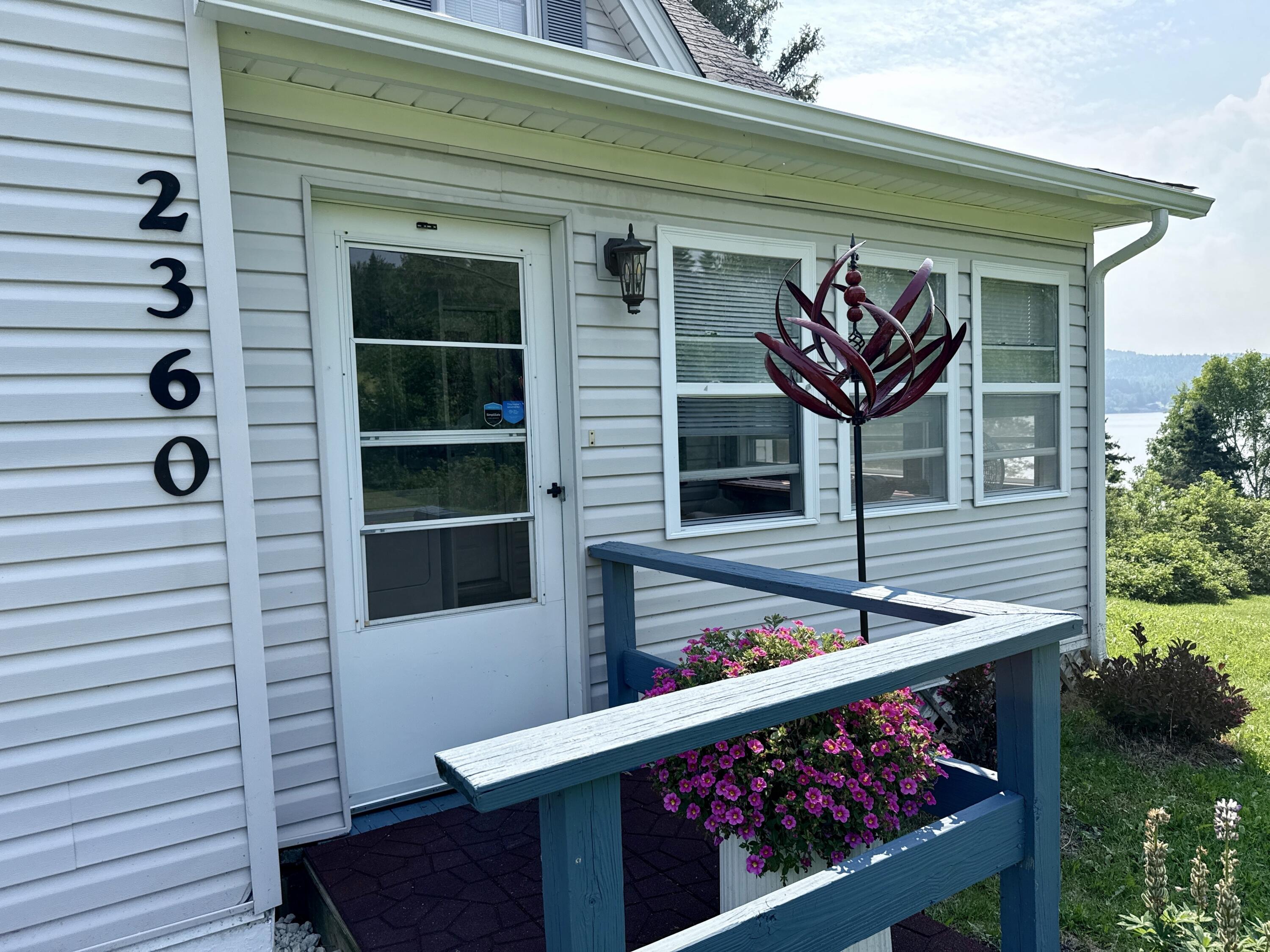 2360 Aroostook Road Eagle Lake, ME 04739 - Photo 8 of 39 Porch Entrance