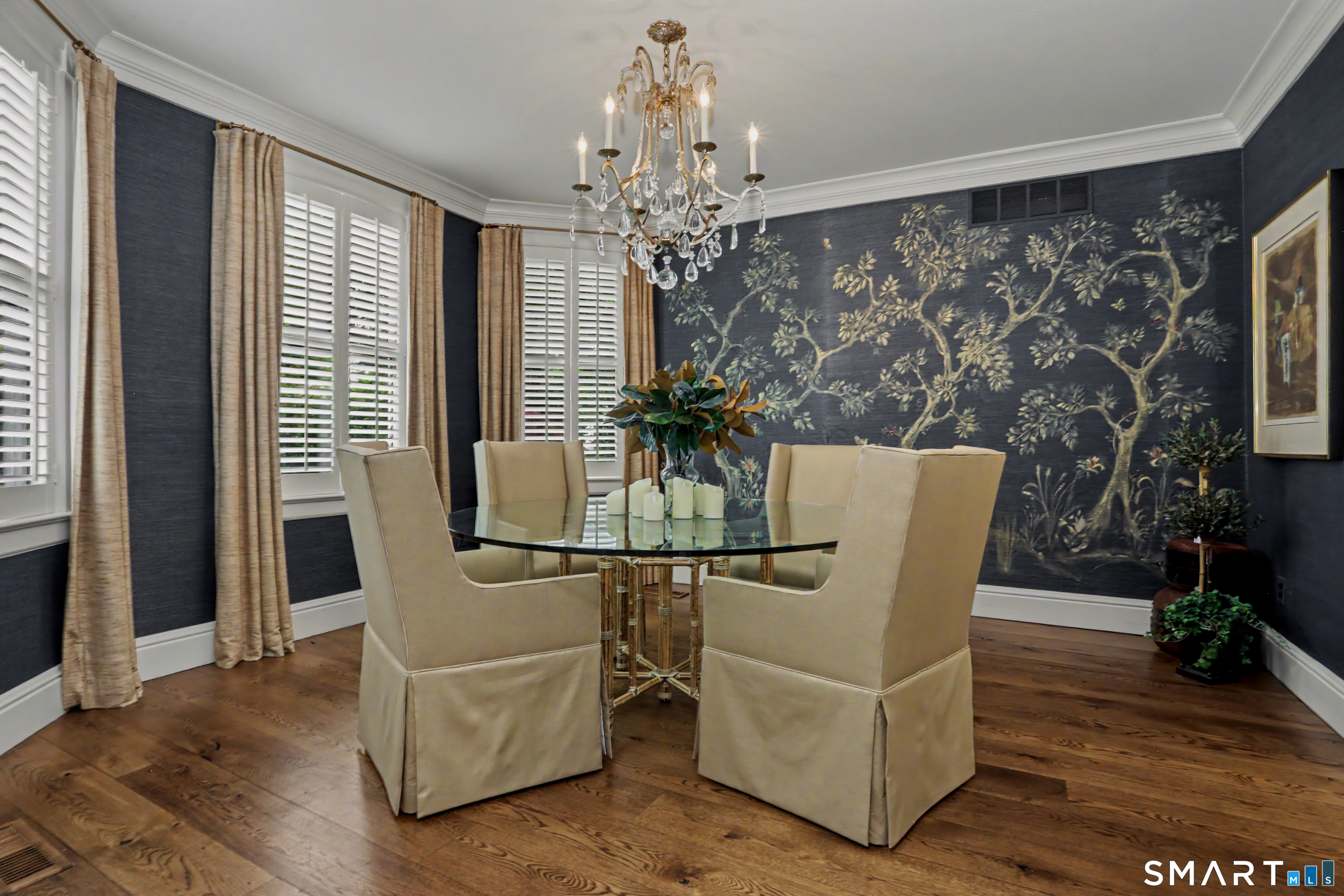 36 Catoonah Street, Unit 18 Ridgefield, CT 06877 - Photo 10 of 40 a view of a dining room with furniture window and wooden floor