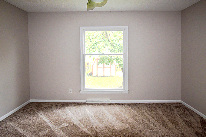 2008 Stanhope Road Springfield, IL 62702 - Photo 9 of 21 a view of an empty room with a window