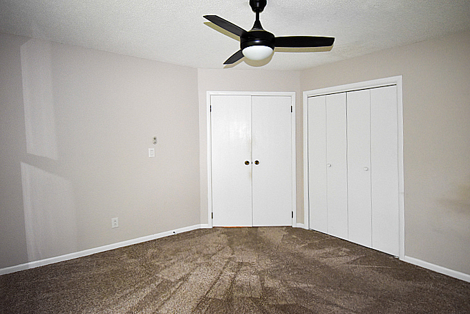 2008 Stanhope Road Springfield, IL 62702 - Photo 10 of 21 a view of empty room with a ceiling fan and window