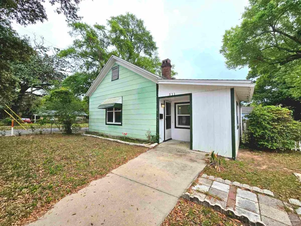 a front view of house with yard