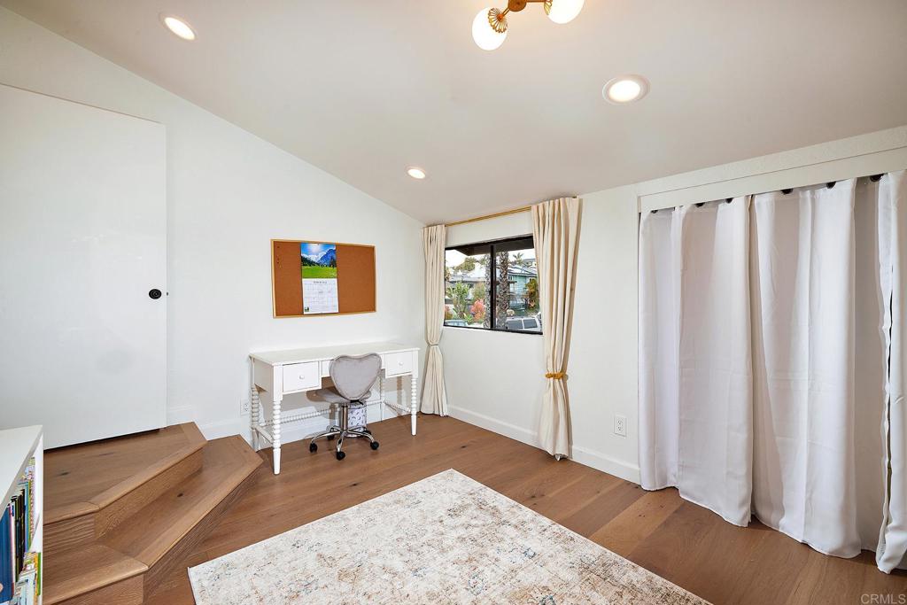 214 Calle De Madera Encinitas, CA 92024 - Photo 19 of 25 a living room with furniture rug and window