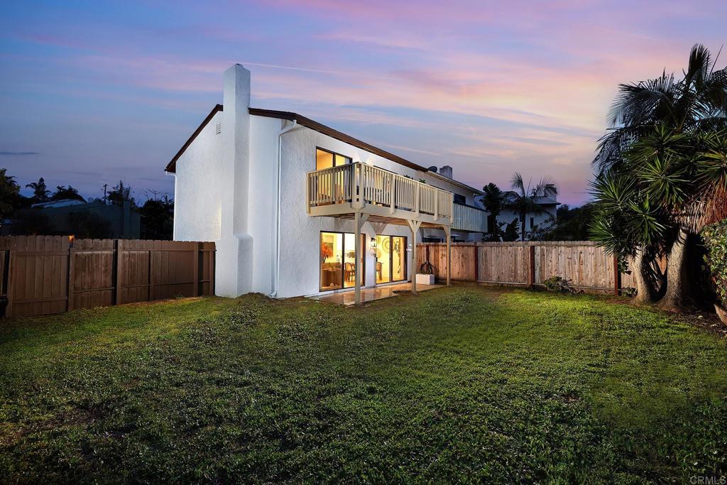 214 Calle De Madera Encinitas, CA 92024 - Photo 2 of 25 a view of a house with backyard and garden