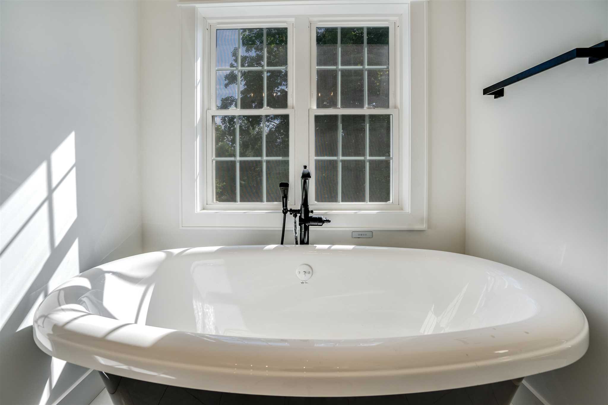 3 Cooper Road Fishkill, NY 12524 - Photo 17 of 26 a white bath tub sitting next to a window