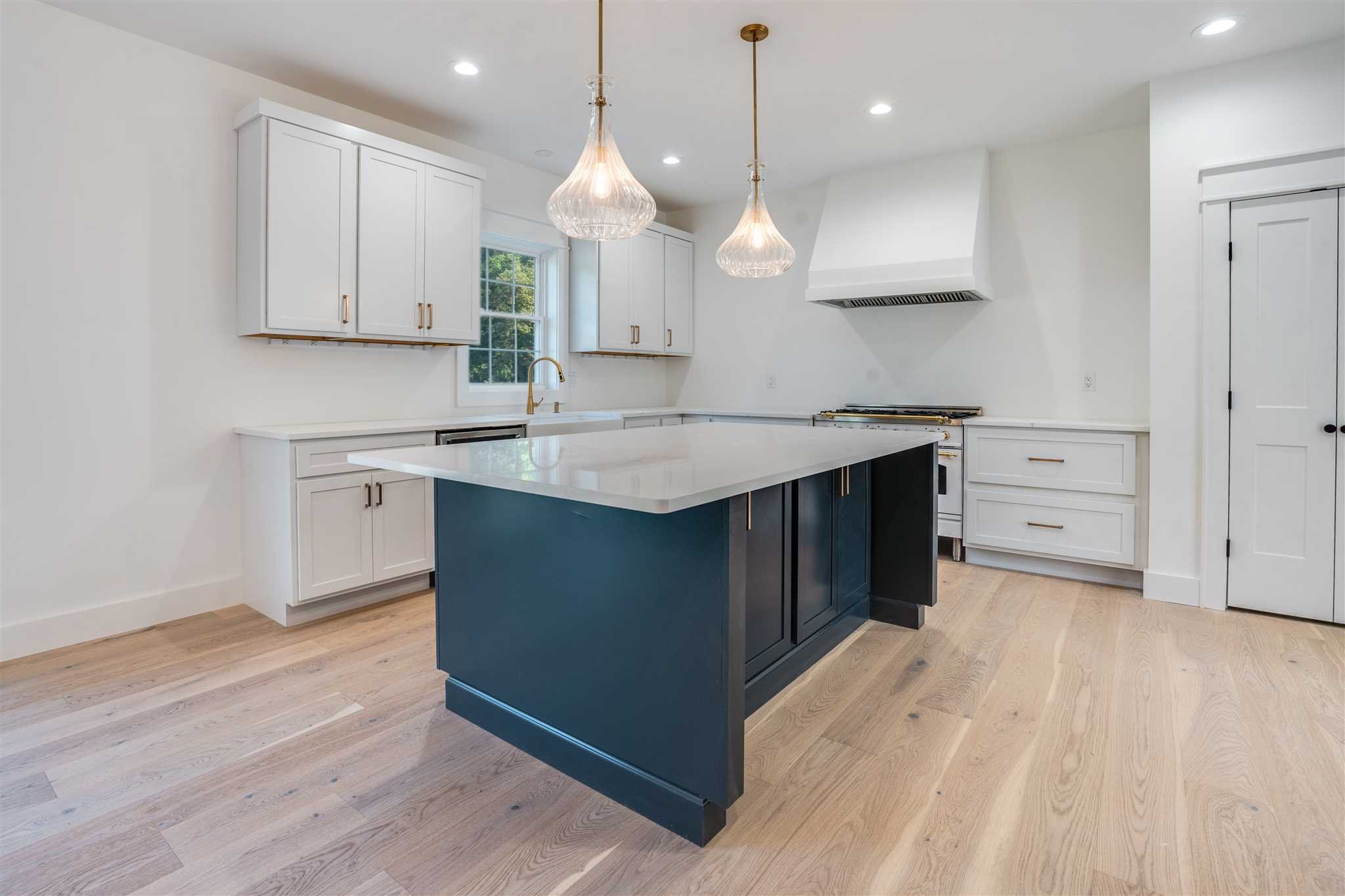 3 Cooper Road Fishkill, NY 12524 - Photo 5 of 26 a kitchen with a sink a center island stainless steel appliances and cabinets