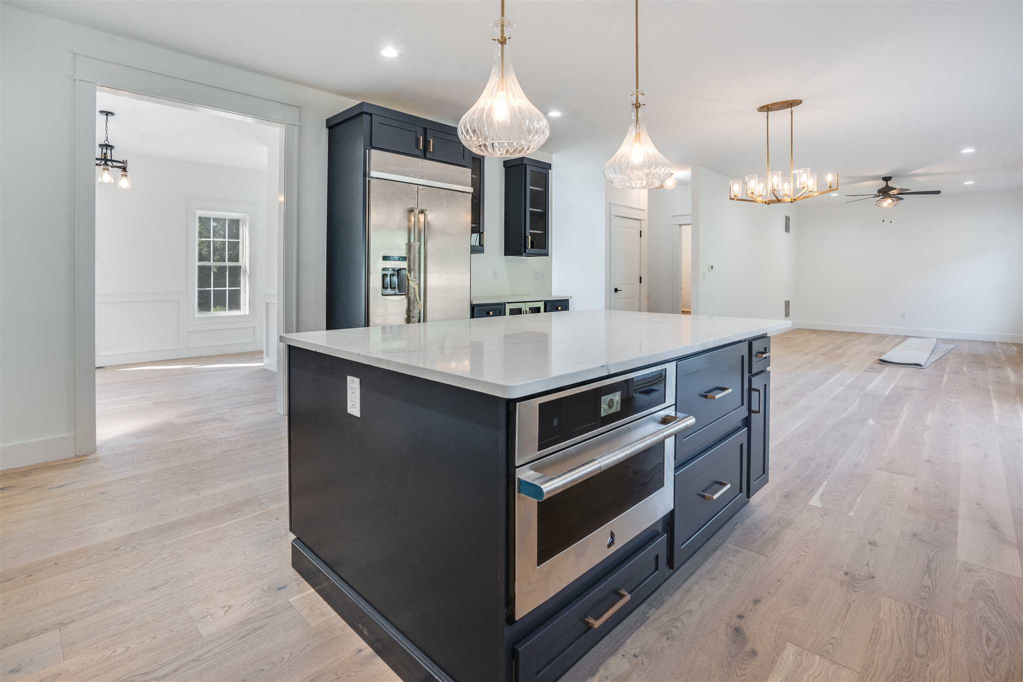 3 Cooper Road Fishkill, NY 12524 - Photo 8 of 26 a kitchen with a stove and a wooden floor