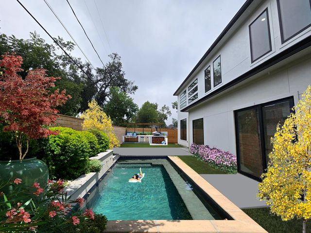 a view of back yard of the house