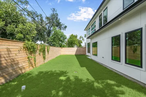 a view of yard with patio