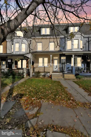 a front view of a building with street view