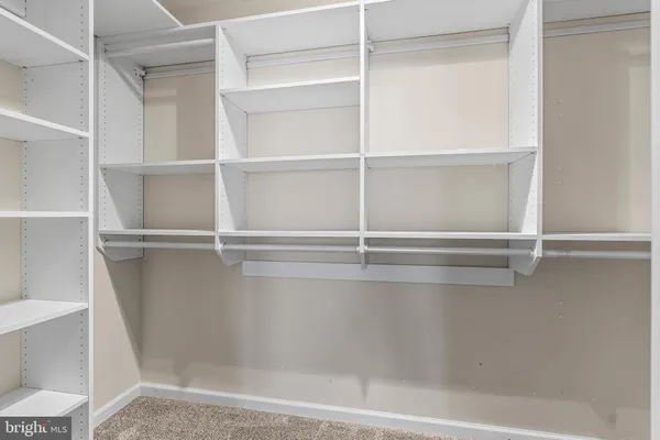 a view of house with backyard