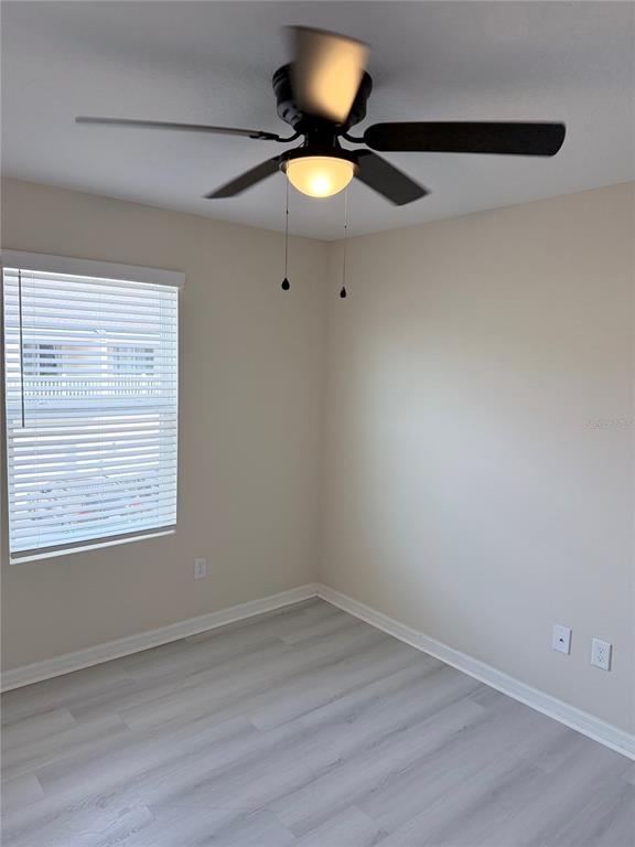 9463 Randal Park Boulevard Orlando, FL 32832 - Photo 15 of 25 an empty room with a window