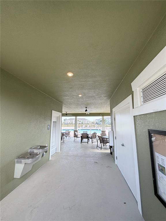 9463 Randal Park Boulevard Orlando, FL 32832 - Photo 22 of 25 a room with lots of table and chair