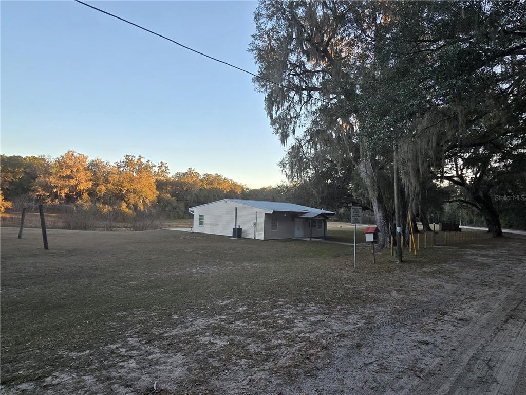 Southwest 136th Ct Road Dunnellon, FL 34432 - Photo 12 of 13 a view of a house with a yard