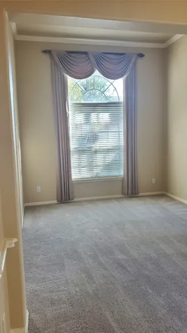 a view of an entryway with a livingroom