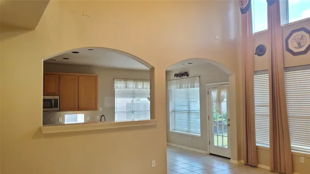 a view of a bathroom with a glass door