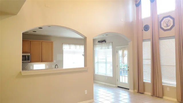 a view of an empty room with window