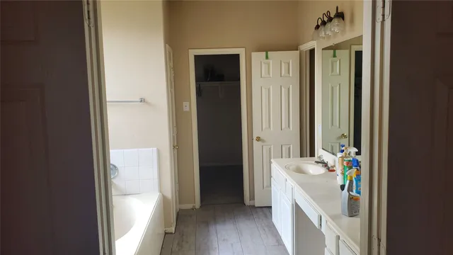 a view of empty room with windows