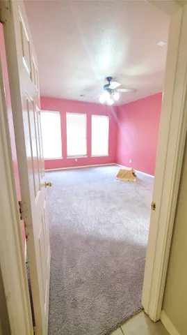 a view of a bathroom with a bathtub