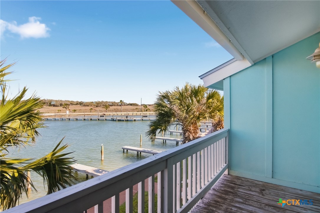 2292 North Fulton Beach Road, Unit 505 Rockport, TX 78382 - Photo 21 of 46 a view of a balcony with chairs