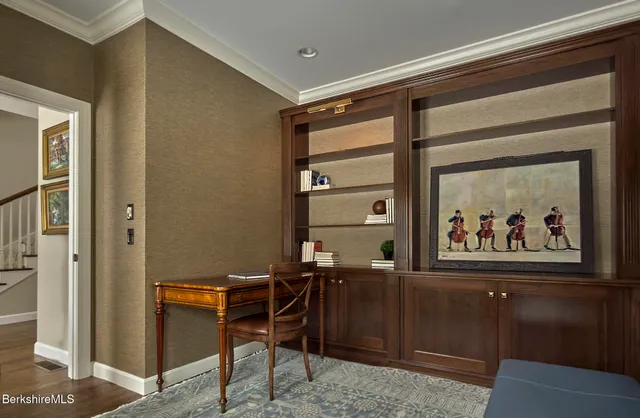 a view of a workspace with furniture