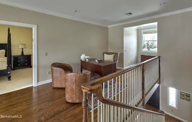 a view of livingroom with furniture and wooden floor