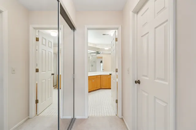 a bathroom with a shower and a sink