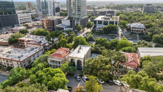 an aerial view of a city with lots of residential buildings