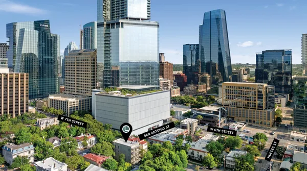 a view of a city with tall buildings