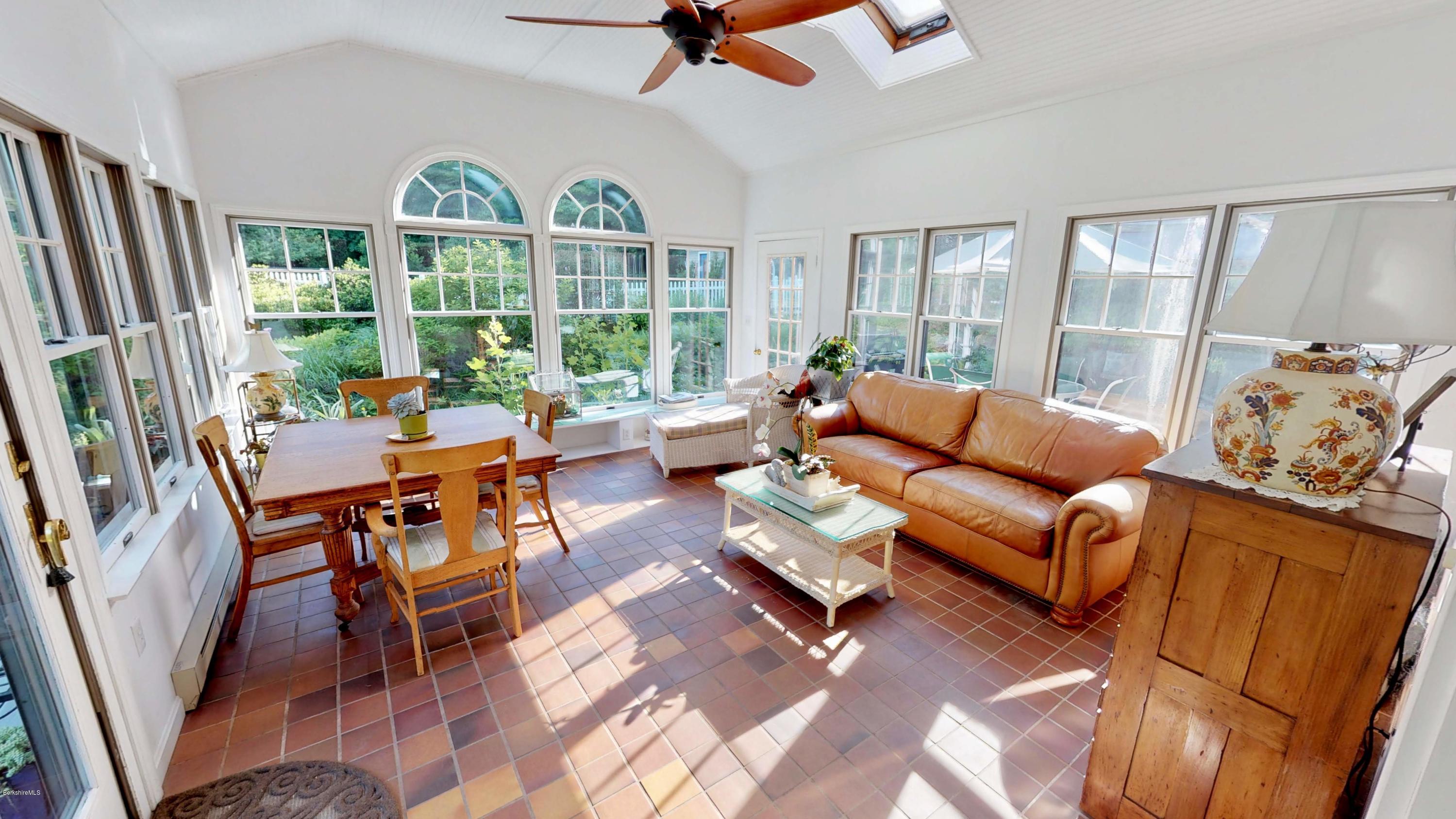 1016 High St Hill Road Windsor, MA 01270 - Photo 17 of 41 a living room with furniture large windows and wooden floor