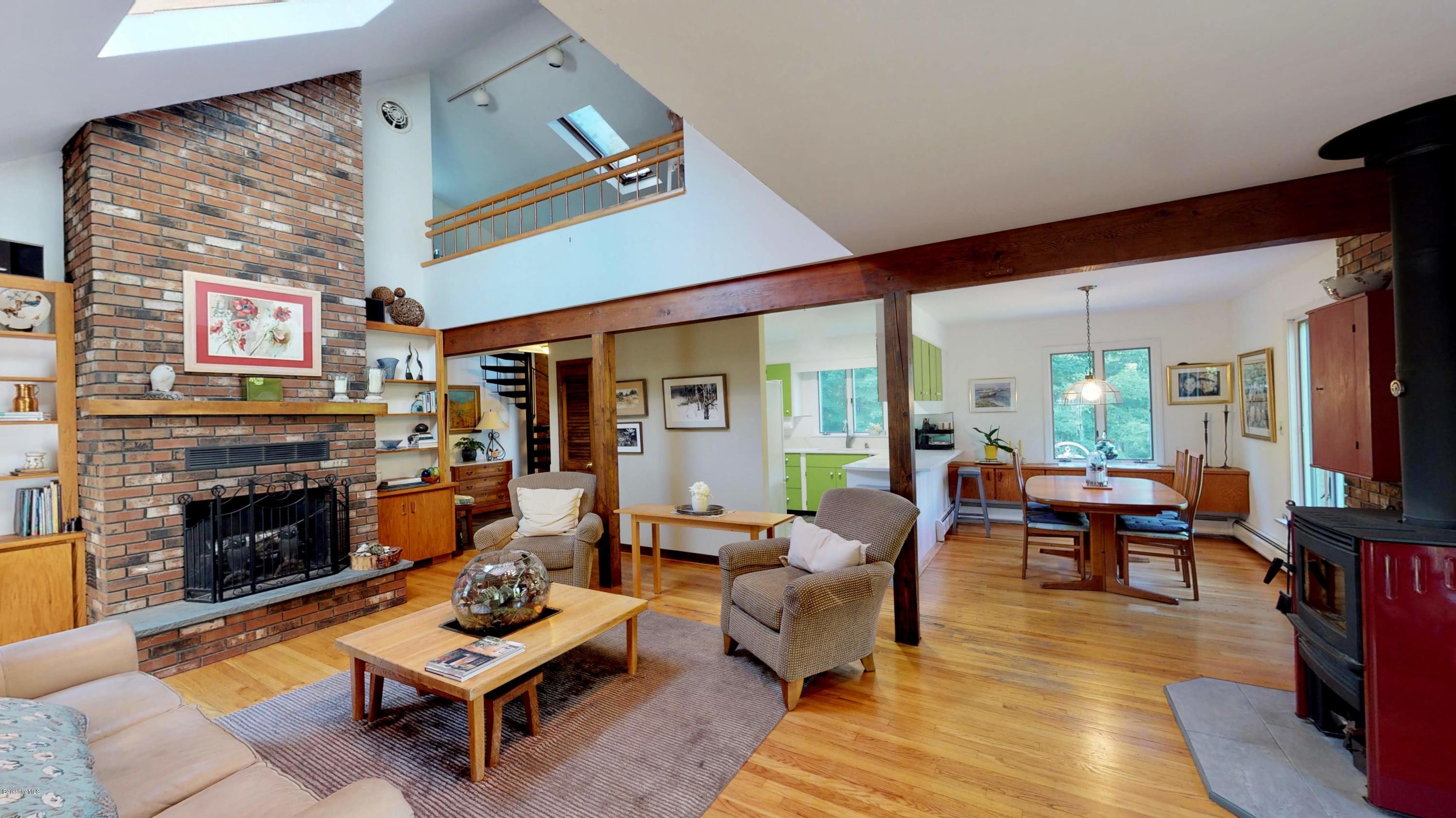 1016 High St Hill Road Windsor, MA 01270 - Photo 20 of 41 a living room with furniture and a fireplace