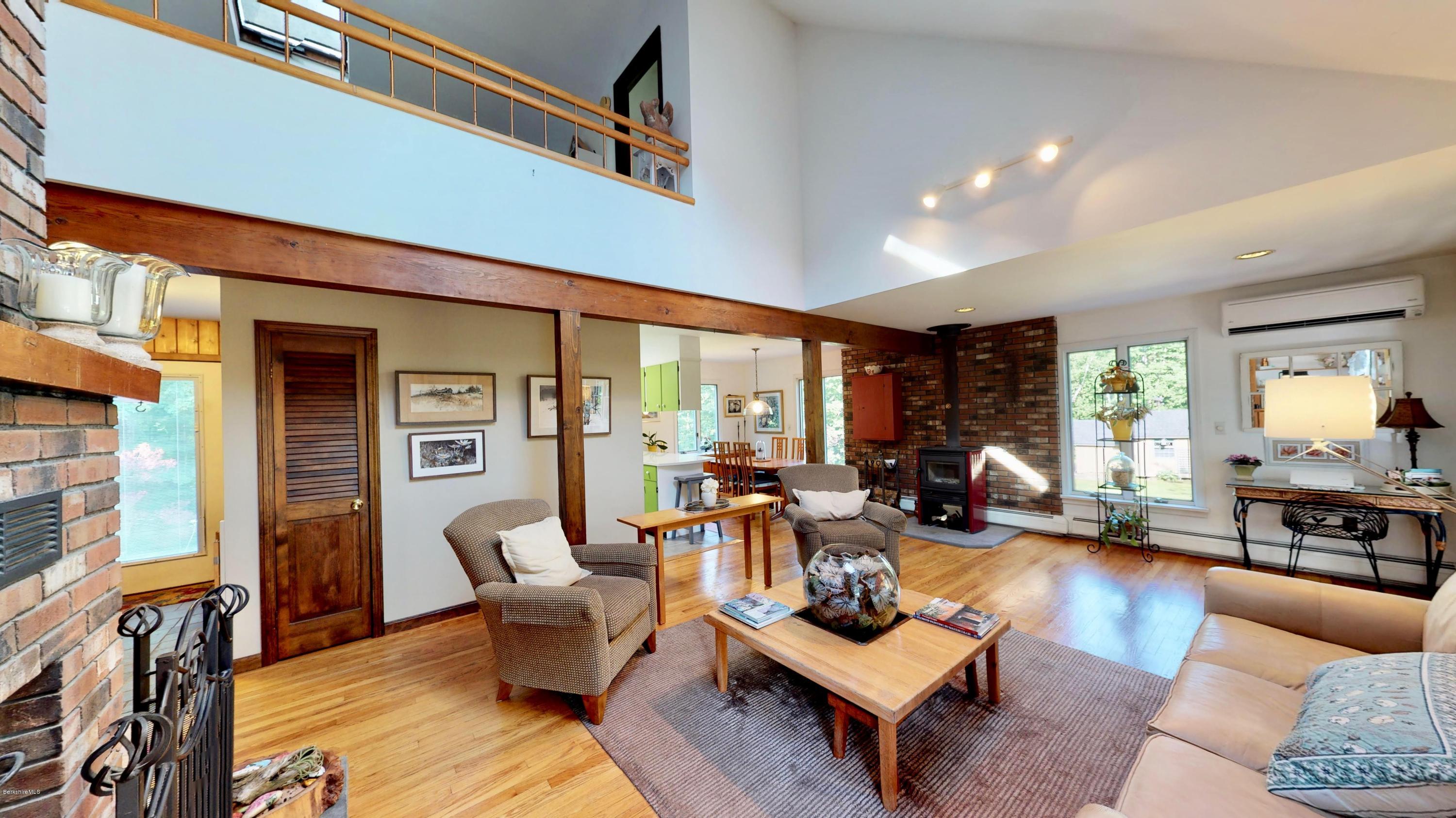 1016 High St Hill Road Windsor, MA 01270 - Photo 23 of 41 a living room with furniture fireplace and a large window