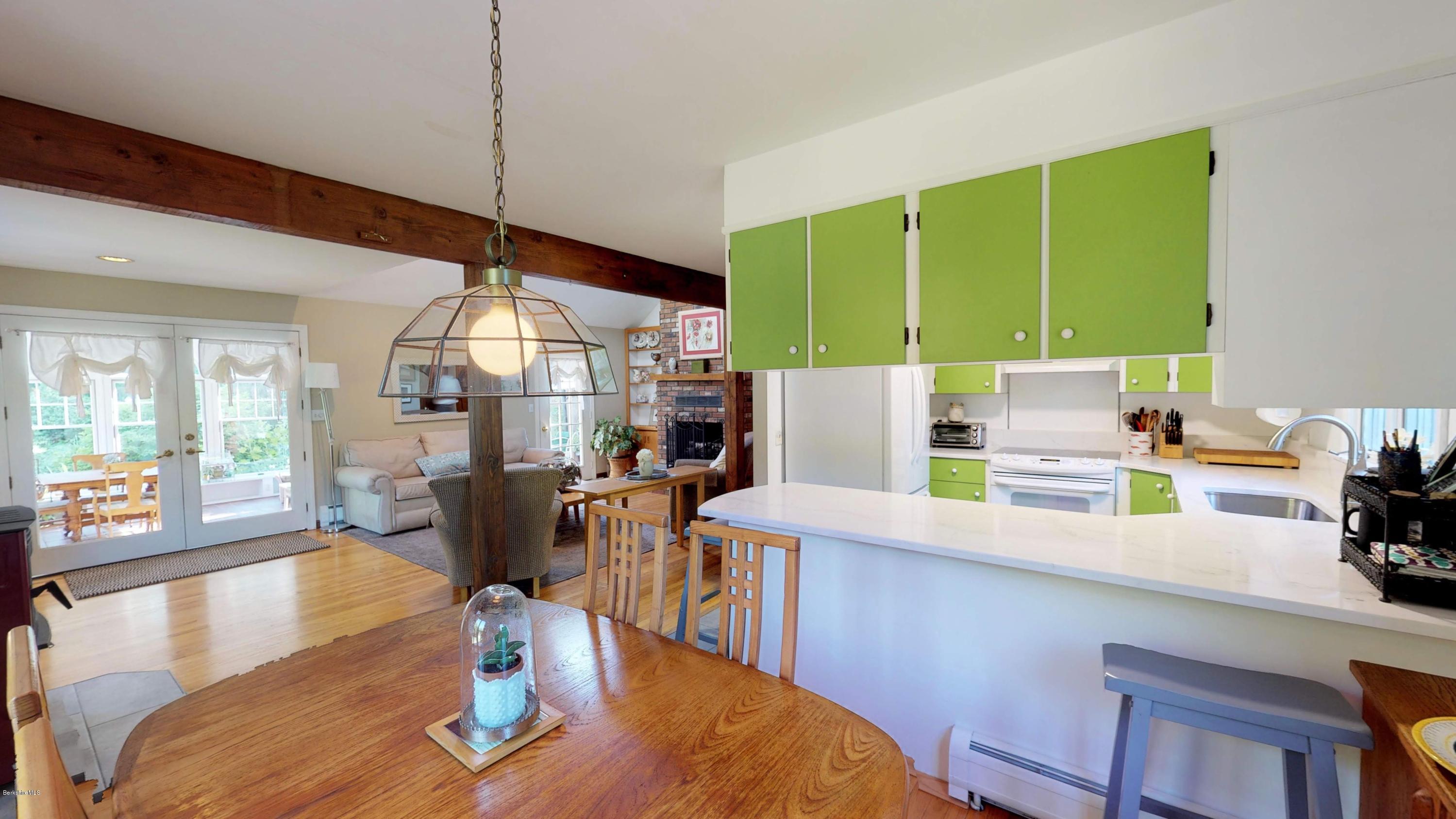 1016 High St Hill Road Windsor, MA 01270 - Photo 25 of 41 a living room with furniture a large window with kitchen view