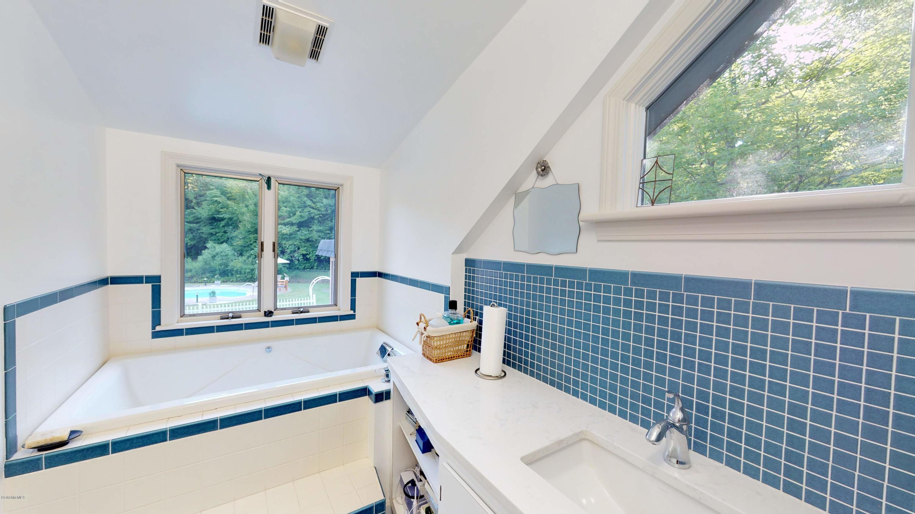 1016 High St Hill Road Windsor, MA 01270 - Photo 33 of 41 a bathroom with a sink and a bathtub