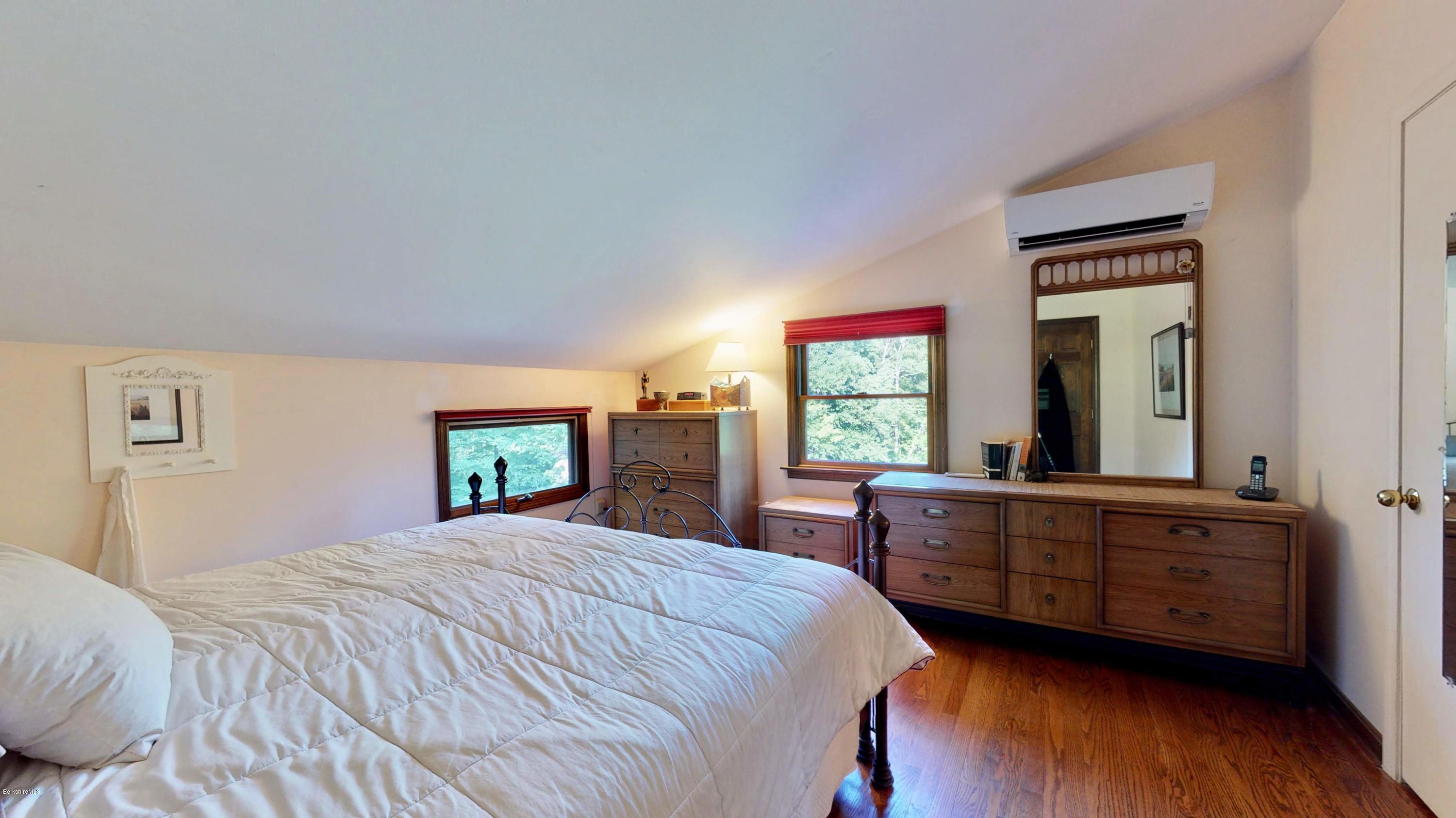 1016 High St Hill Road Windsor, MA 01270 - Photo 35 of 41 a bedroom with a large bed and a large window