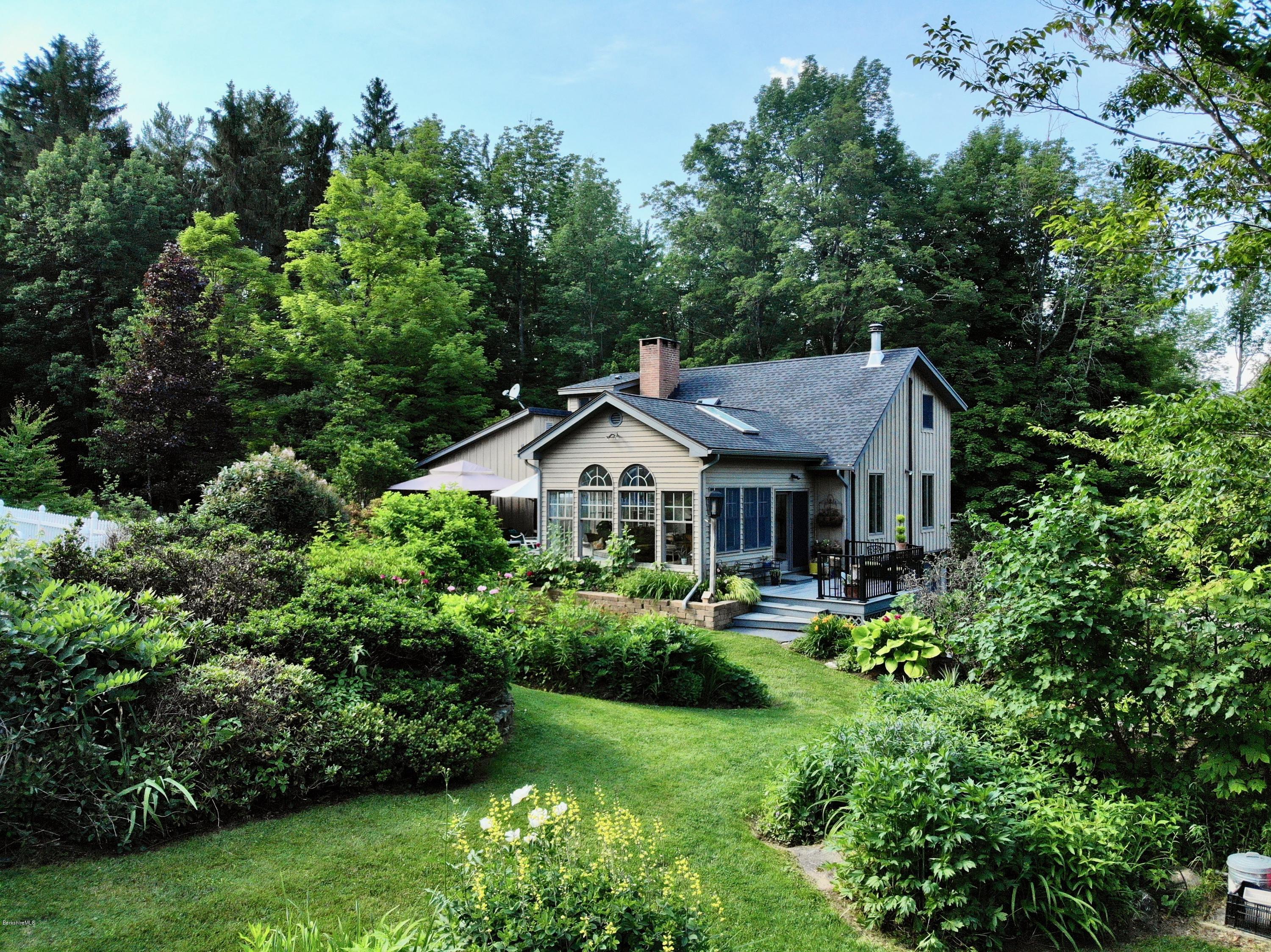 1016 High St Hill Road Windsor, MA 01270 - Photo 40 of 41 a front view of a house with a yard