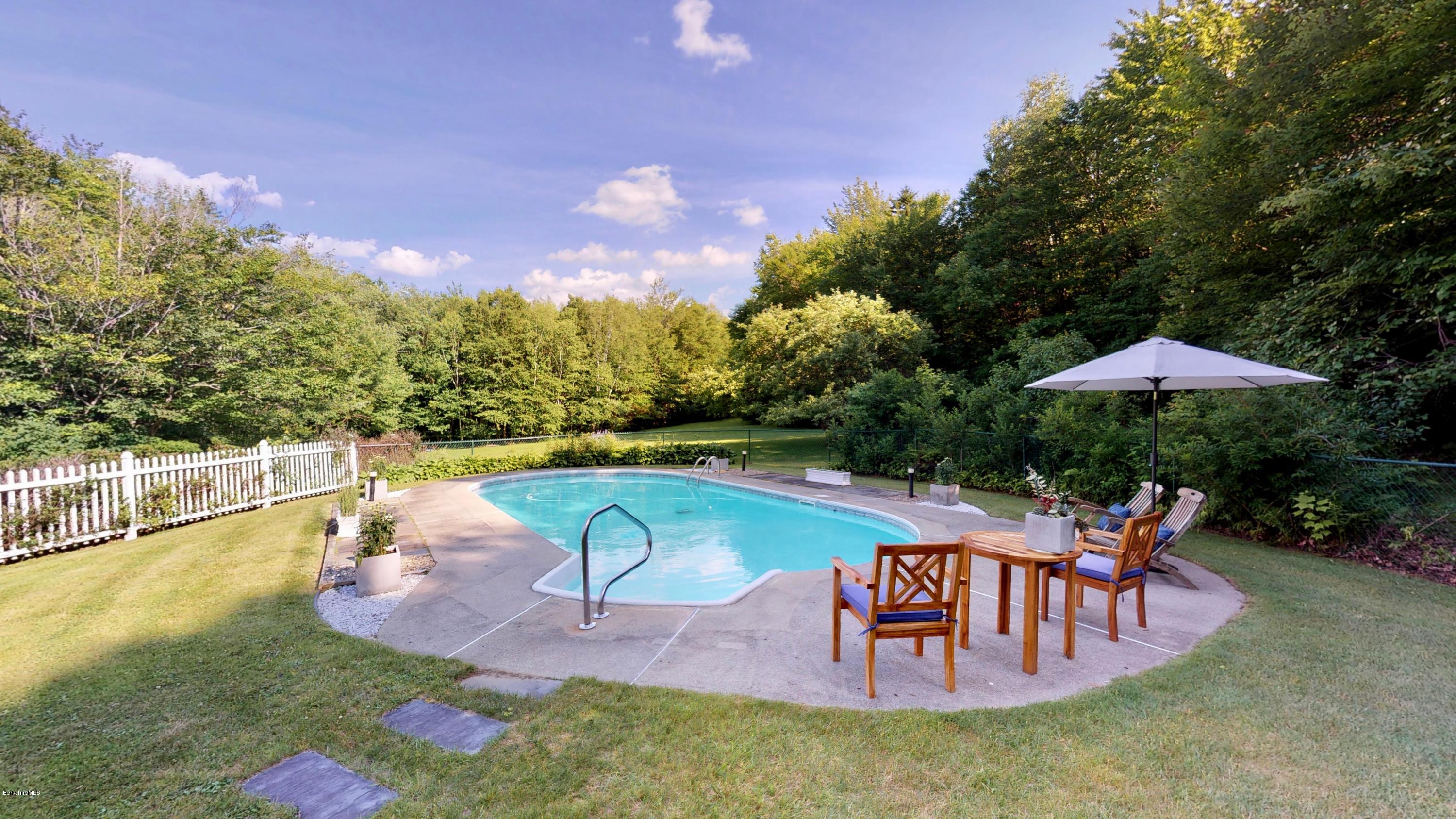 1016 High St Hill Road Windsor, MA 01270 - Photo 7 of 41 a view of a swimming pool with a patio